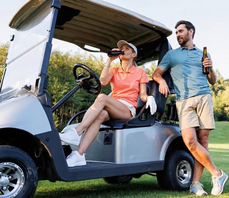 Drinking beer in a golf cart